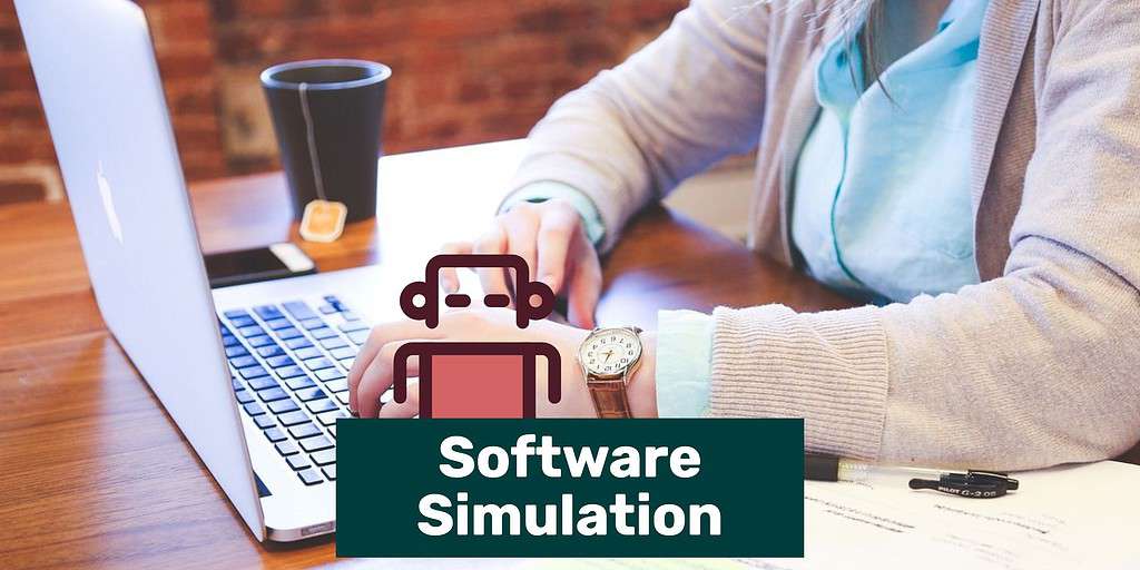 A person at a desk with their hands on a laptop, a notebook, and a coffee too. Text overlay says "software simulation" and has a cute little robot behind the text box.